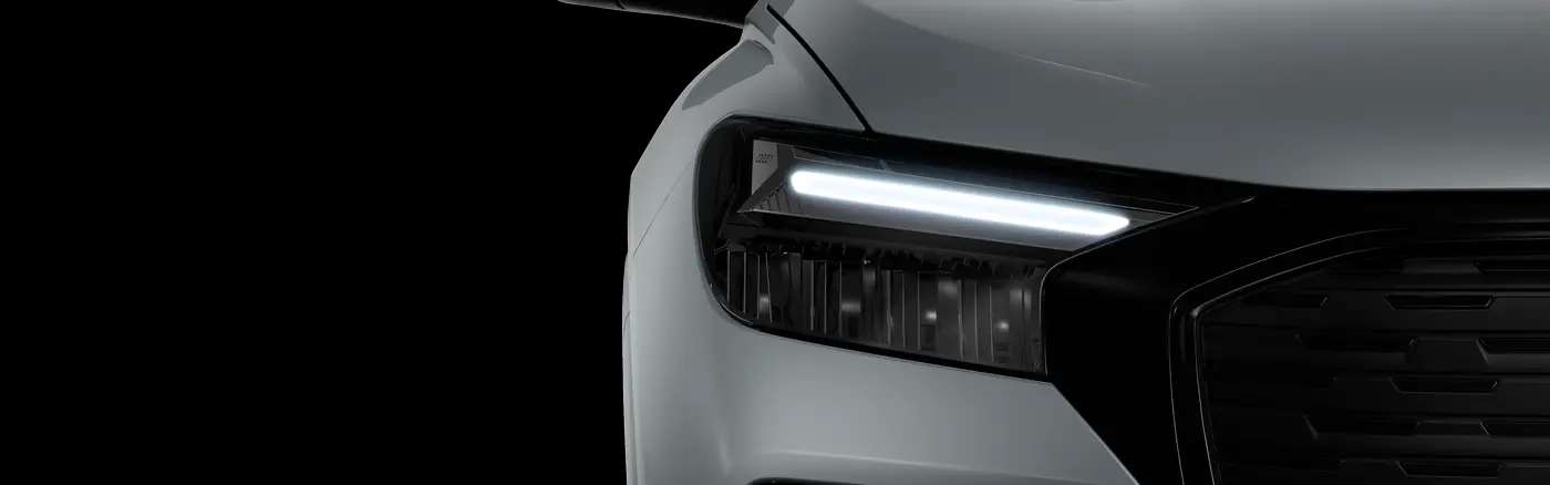 Detailansicht der Frontscheinwerfer eines Audi Q4