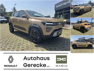 Schräge Frontansicht auf einen Dacia Spring , freigestellt