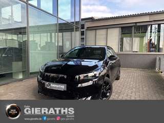 Schräge Frontansicht auf einen Opel Corsa , freigestellt