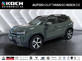 Schräge Frontansicht auf einen Dacia Duster , freigestellt