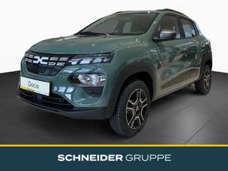 Schräge Frontansicht auf einen Dacia Spring , freigestellt
