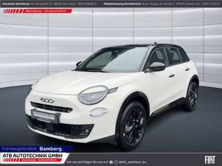 Schräge Frontansicht auf einen Fiat 600 , freigestellt