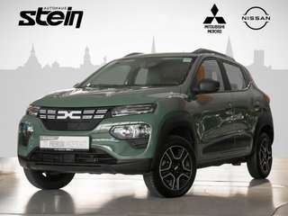 Schräge Frontansicht auf einen Dacia Spring , freigestellt